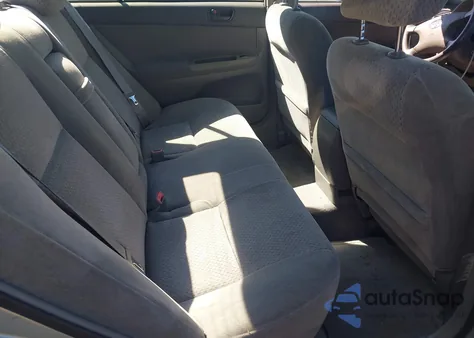 2003 Toyota Camry Le z USA, uszkodzony, nr VIN 4T1BE32K13U123714